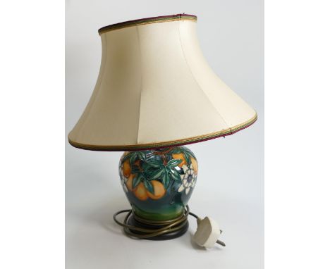 Moorcroft lamp in Passion Flower pattern: Actual lamp base without wooden base or fitting measures 18cm high.  Original Moorc