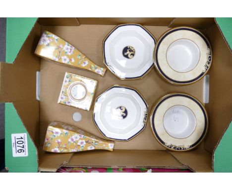 A collection of Wedgwood items to include: May Flowers patterned vases &amp; mantle clock, Cornucopia patterned dishes &amp; 