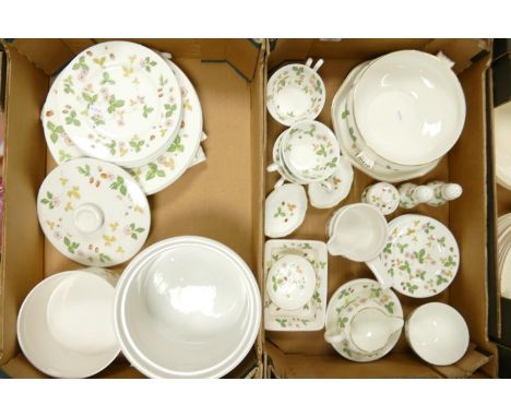 A large collection of Wedgwood Wild Strawberry patterned tea &amp; dinner ware to include: dinner plates, side plates, tea cu