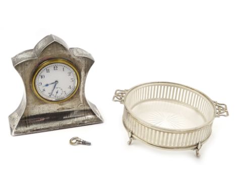 Silver cased Swiss Made dressing table clock by Joseph Gloster Ltd and a silver butter/preserve dish with glass liner, Birmin