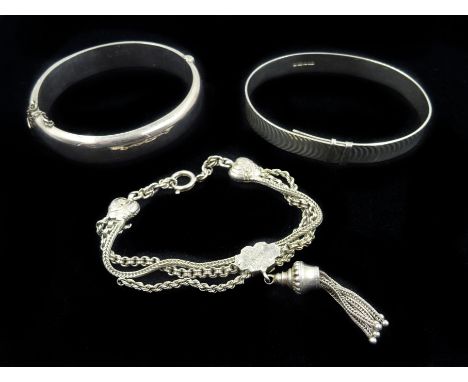 Silver hinged bangle Chester 1954, silver bangle Birmingham 1975 and a silver watch chain bracelet Condition Report Click her