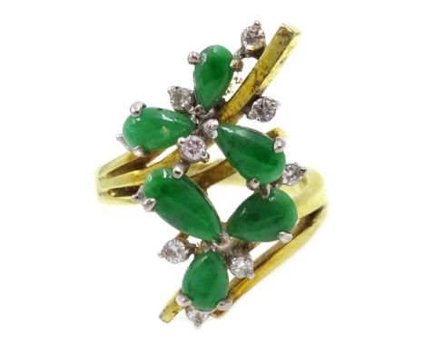 14ct gold jade and diamond flower design ring, stamped 585 Condition Report Approx 7.5gm, size K-L, head length = 25mm Click 