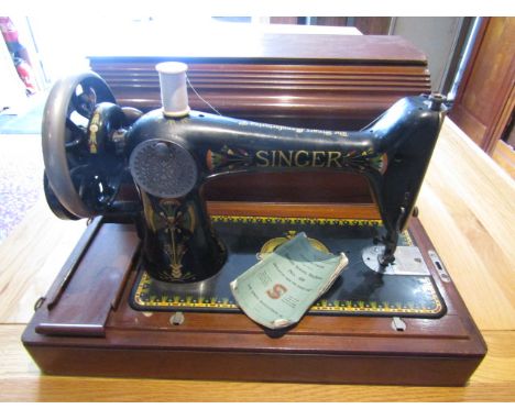 Vintage Singer sewing machine with painted thistle design in wooden case with key with original manual