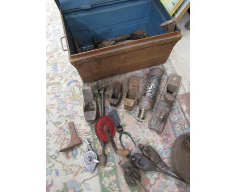 a vintage metal trunk containing vintage tools