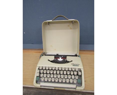 Vintage Olympia Splendid 33 typewriter in case&nbsp;
