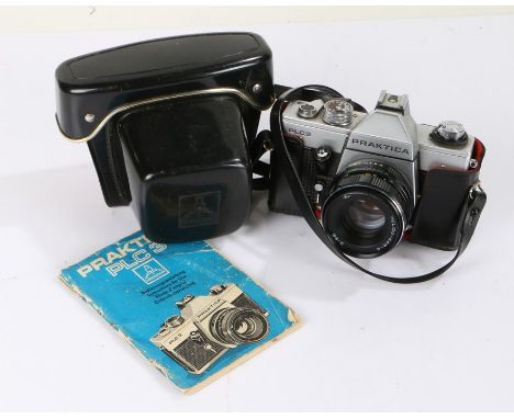 Praktica PLC3 camera, with a Helios-44M-4 lens, f/2 58mm, housed in a Pentacon case with manual 