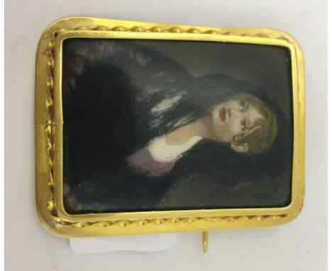 An Edwardian painted porcelain brooch in 18ct frame; porcelain marked 'K' with crown