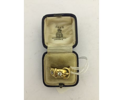An 18ct diamond set buckle ring