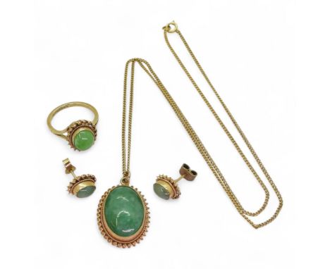 A suite of Chinese green hardstone jewellery, to include a 9ct gold ring, size J, a 9ct pendant on a 46cm 9ct chain, and a pa