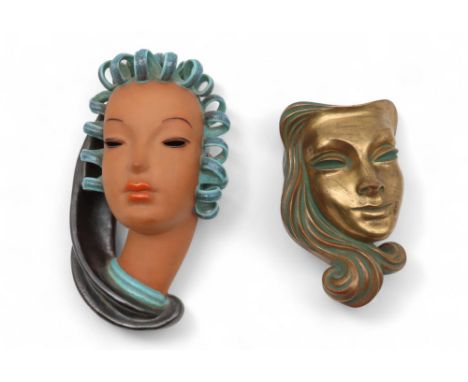 A Goldscheider style face lady mask, modelled with curly green hair and a black scarf, together with an Achatit pottery face 