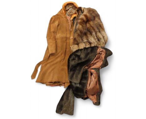 A fox fur shrug, a fur coat and a suede coat Condition Report:Available upon request