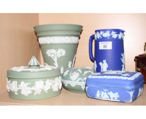 A Wedgwood green jasperware vase with tapering sides, 6 3/4" high, two similar trinket boxes and a similar blue jasperware ju