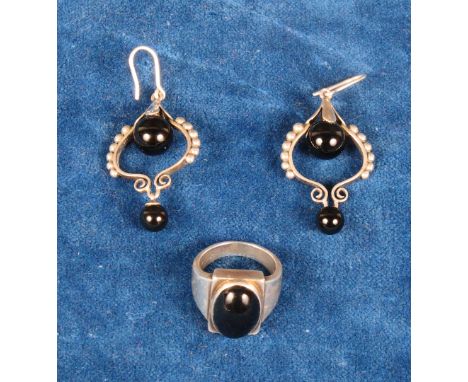 A pair of Georg Jensen silver and black agate "Moonlight Blossom" earrings and a similar ring, No. 84A