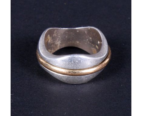 A Georg Jensen silver and yellow metal ring, No. 313