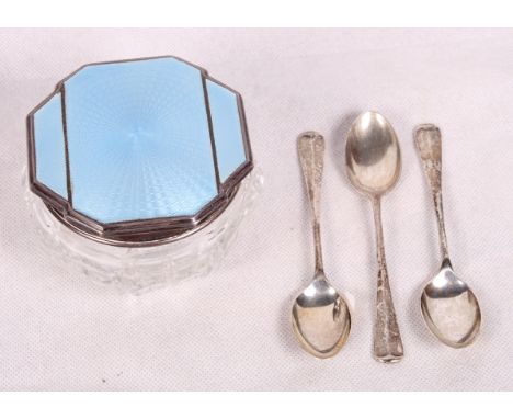 Three silver teaspoons and a cut glass dressing table jar with silver and blue guilloche enamel lid