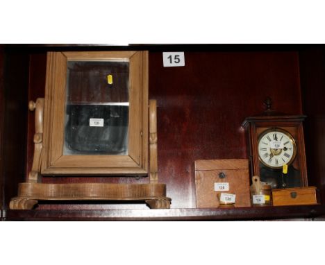 A Victorian swing toilet mirror in pine frame, a shelf clock, an oak tea caddy, a Mauchline decorated box, a wooden pin cushi