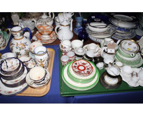 A 19th Century turquoise and gilt decorated teapot, a matching sugar bowl and three saucers, a tangerine and gilt decorated s