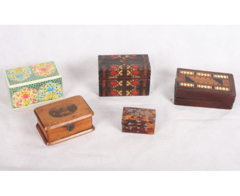 An 18th Century miniature blond tortoiseshell box fitted two glass bottles, a Mauchline ware box, a folding cribbage maker an