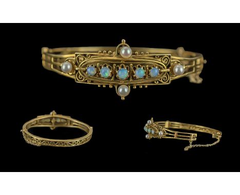 Victorian Period 1837 - 1901 14ct Gold Ornate Openwork Opal and Pearl Set  Hinged Bangle of wonderful proportions and design,