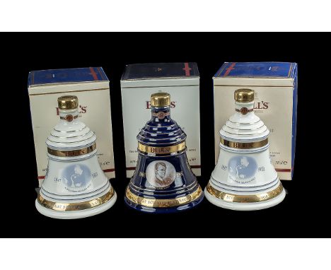 Three Bottles of Bells Old Scotch Whisky Christmas Decanters,  full contents, 8 years old, in original boxes. Dates 2 x 2001 