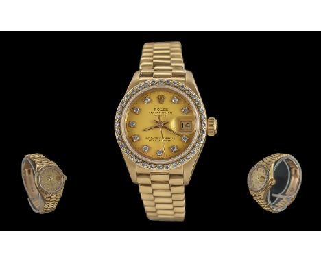 Rolex oyster perpetual date-just ladies 18ct gold chronometer wrist watch. features diamond set markers and bezel by Rolex, c