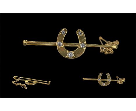 Antique Period 18ct Gold Diamond Set Horseshoe Brooch with safety chain, marked 18ct, set with five semi-cushion cut diamonds