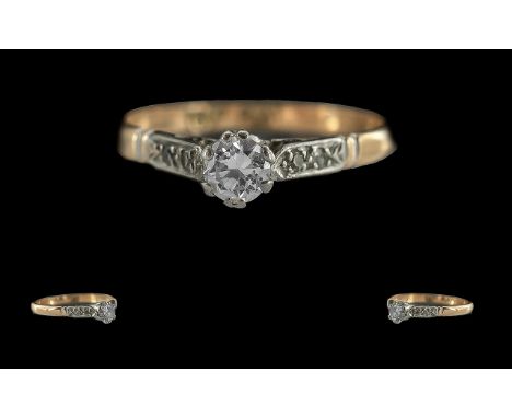 18ct gold and platinum diamond set ring. marked 18ct and platinum to interior of shank. the central brilliant cut diamond of 