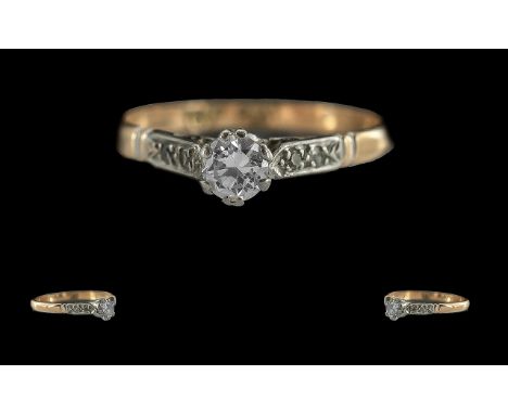 18ct gold and platinum diamond set ring. marked 18ct and platinum to interior of shank. the central brilliant cut diamond of 