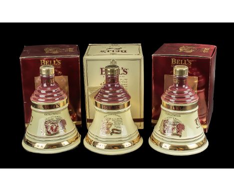 Three Bottles of Bells Old Scotch Whisky Christmas Decanters,  full contents, 8 years old, in original boxes. Dates 2 x 1996 