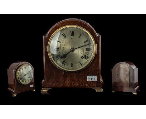 Oak Mantle Clock by William Gilbert. Winsted, USA, Roman numerals, brass pendulum, brass feet.  Measures 12'' high.