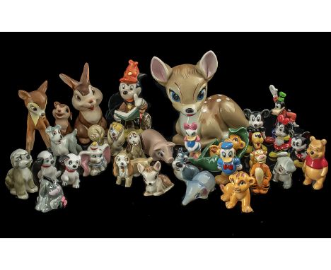 Box of Figures, including four Goebel Disney figures, 14 small Disney figures, and 12 Wade figures.