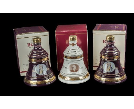 Two Bottles of Bells Old Scotch Whisky Christmas Decanters,  full contents, 8 years old, in original boxes. Dates 2001 and 20