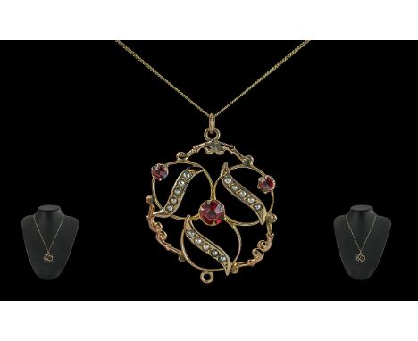 Ladies 9ct Gold Garnet and Seed Pearl Open worked Pendant with Attached 9ct Gold Chain, Marked 9ct. Length 20 Inches - 50 cms