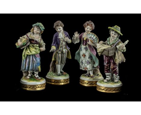 Sitzendorf - Two Pairs of Fine Quality Hand Painted Porcelain Figures. mid 20th century, one pair depicting ragged peddlers, 