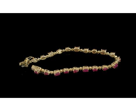 Attractive Multi Cut Ruby Bracelet, 8.5cts of rubies, oval cut, pear cut and baguette cut, repeated in a single 8 inch (20cm)