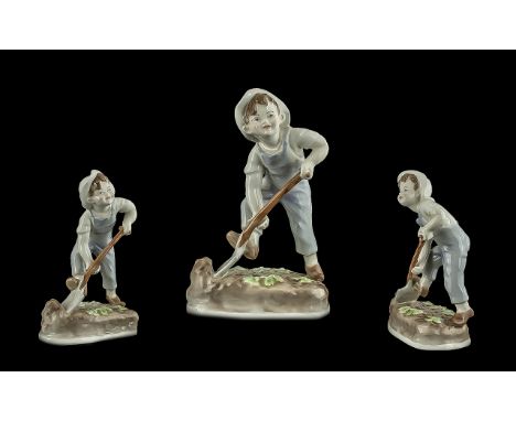 Royal Worcester Hand Painted Porcelain Figure ' Saturdays Child Works Hard For A Living'. Modeller Freda Doughty. issued 1930