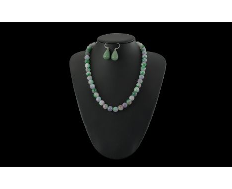 Lavender Jade Beaded Necklace, 18'' length, together with a pair of jade drop earrings.