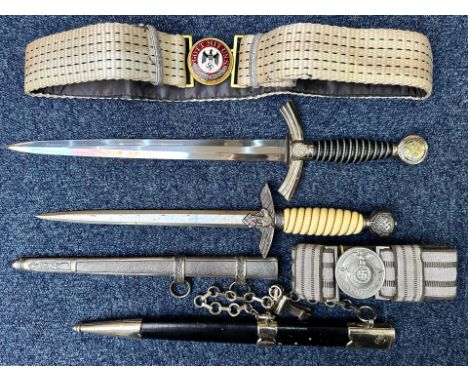 Two Copy German Daggers, Luftwaffe First &amp; Second Pattern, together with two copy belt and buckles, one a SS Officer and 