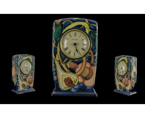 Moorcroft Mantle Clock, marked to base Moorcroft and 2000, pomegranate pattern.  Moorcroft Pottery CL1 Clock, Queen's Choice 