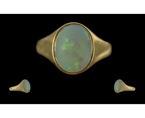 Ladies Excellent 18ct Gold SIngle Stone Opal Set Ring, Full hallmark to shank, the oval shaped opal of pleasing colour, est 4