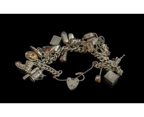 Fine Quality Sterling Silver Charm Bracelet Loaded with Approx 20 Silver Charms, All Marked for Sterling Silver. Comprises 10