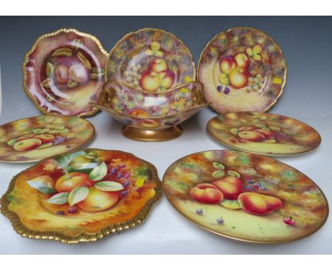 A SELECTION OF HAND PAINTED 'FRUIT DESIGN' CHINA IN THE WORCESTER STYLE, to include a twin handled table centrepiece signed b
