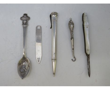 A WHITE METAL ROLEX ADVERTISING SPOON, together with a hallmarked silver bookmark, a small fruit knife with mother of pearl c