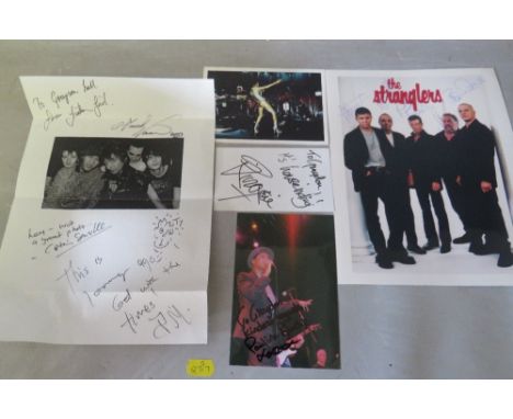 A TRAY OF AUTOGRAPHS AND PHOTOGRAPHS, LETTERS, CARD AND PAPER OF POP STARS AND GROUPS, to include Sham 69, Angelic Upstarts, 