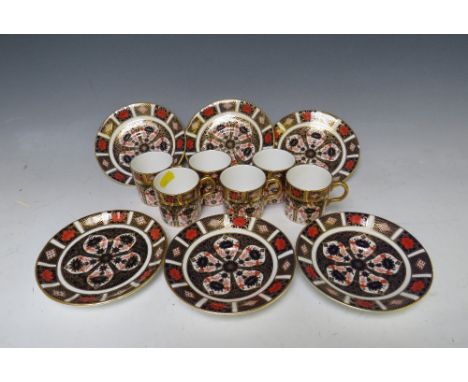 SIX ROYAL CROWN DERBY COFFEE CUPS AND SAUCERS, all Imari pattern no. 1128 (one item A/F)Condition Report:One item is as found