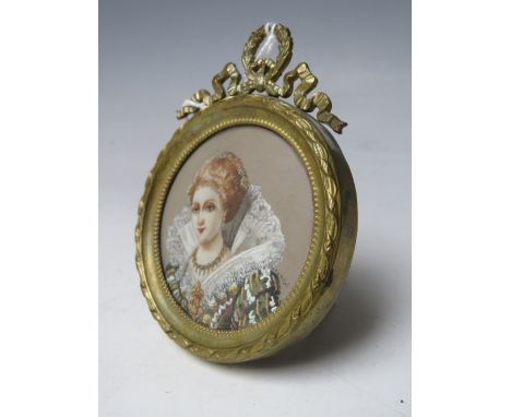A LATE 19TH / EARLY 20TH CENTURY CIRCULAR PORTRAIT MINIATURE OF QUEEN VICTORIA, indistinctly signed lower right, in decorativ