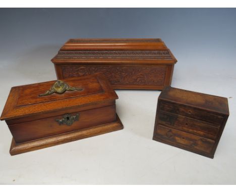 THREE ANTIQUE TREEN BOXES, comprising a carved rectangular example with additional hinged storage compartment to lid, L 39 cm