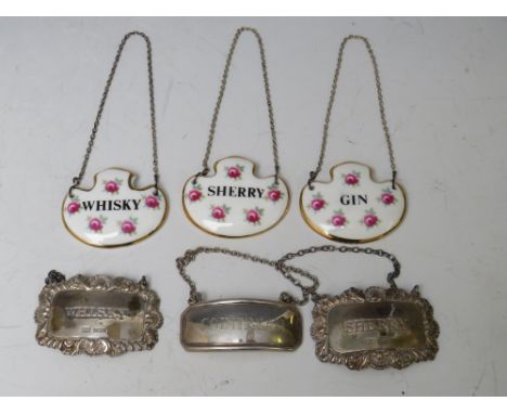 THREE VINTAGE HALLMARKED DECANTER LABELS, whisky, sherry and cointreau, together with three Royal Adderley ceramic labels - s