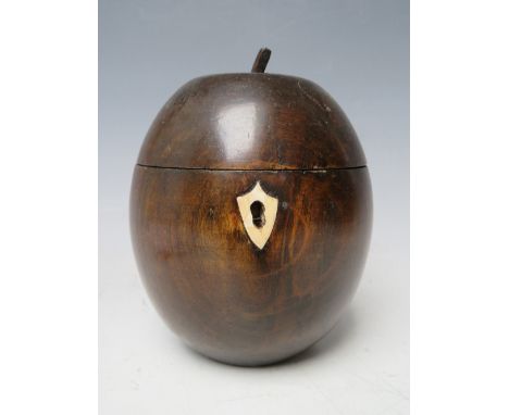 A 20TH CENTURY TEA CADDY IN THE FORM OF A PIECE OF FRUIT, overall H 14 cm