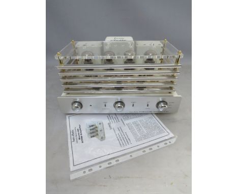 AN ICON AUDIO STEREO 50 VALVE AMPLIFIER, housed under thick plexiglass cover complete with instruction manual
